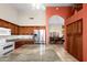 Bright kitchen with stainless appliances and view into the dining room at 6339 S Palo Blanco Dr, Gold Canyon, AZ 85118