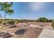 Outdoor picnic area with tables and beautiful landscaping, perfect for gatherings at 6339 S Palo Blanco Dr, Gold Canyon, AZ 85118