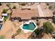Overhead view showing private backyard pool and desert landscaping of home at 6428 E Shea Blvd, Scottsdale, AZ 85254