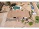 Full aerial view of backyard featuring a spacious pool area and tidy landscaping at 6428 E Shea Blvd, Scottsdale, AZ 85254