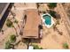 Aerial view of home with large pool and desert landscaping at 6428 E Shea Blvd, Scottsdale, AZ 85254