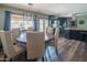 Open dining area with wood table and chairs, connecting to the kitchen at 6428 E Shea Blvd, Scottsdale, AZ 85254