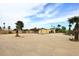Expansive lot with desert landscaping, driveway and attached garage at 6428 E Shea Blvd, Scottsdale, AZ 85254