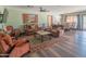 Open-concept living room with sofas and view into dining area and kitchen at 6428 E Shea Blvd, Scottsdale, AZ 85254