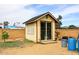 This backyard features a shed, offering potential space for storage or a workshop at 6428 E Shea Blvd, Scottsdale, AZ 85254