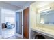 Bedroom view into living area with vanity at 6721 E Mcdowell Rd # H324, Scottsdale, AZ 85257
