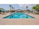 Inviting outdoor pool with plenty of seating for relaxation in a resort-style community at 6721 E Mcdowell Rd # H324, Scottsdale, AZ 85257