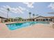 Inviting outdoor pool with plenty of seating for relaxation in a resort-style community at 6721 E Mcdowell Rd # H324, Scottsdale, AZ 85257