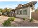 Charming home featuring well-maintained landscaping with beautiful windows and a beige exterior at 7336 S 48Th Gln, Laveen, AZ 85339