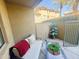 Inviting patio with cozy seating, stylish decor, and a view of lush landscaping at 815 E Rose Ln # 105, Phoenix, AZ 85014