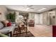 Spacious living room with tile floors, neutral colors, large windows, and comfortable seating at 8229 E Farmdale Dr, Mesa, AZ 85208