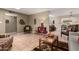 Bright living room with unique décor, tile flooring, and open floor plan design at 8229 E Farmdale Dr, Mesa, AZ 85208
