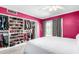 Primary bedroom featuring a large closet with a view of the backyard and pool at 860 N Mcqueen Rd # 1213, Chandler, AZ 85225