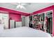 Bright bedroom with a large closet, dresser, and bathroom access at 860 N Mcqueen Rd # 1213, Chandler, AZ 85225