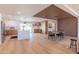 Spacious open floor plan showcases a modern kitchen, dining area, and seamless living space with stylish accents at 8602 E Whitton Ave, Scottsdale, AZ 85251