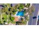 Aerial view showcasing the community pool, cabana, and surrounding landscaping for a serene oasis at 8841 S 51St St # 1, Phoenix, AZ 85044