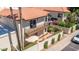 Aerial view showcasing the home, patio area, balcony, and surrounding landscape at 8841 S 51St St # 1, Phoenix, AZ 85044