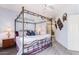 Spacious primary bedroom with ceiling fan and a cozy queen bed at 8841 S 51St St # 1, Phoenix, AZ 85044