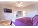 Bedroom with a TV, wood floors, and plenty of space to relax after a long day at 910 W Redondo Dr, Gilbert, AZ 85233