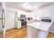 Bright kitchen with stainless steel appliances and white quartz countertops at 910 W Redondo Dr, Gilbert, AZ 85233