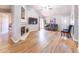 Spacious living room with a fireplace, tile floors, and a sliding glass door at 910 W Redondo Dr, Gilbert, AZ 85233