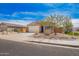 Cozy single-story home with desert landscaping and a convenient two-car garage at 947 E Wiley Way, Casa Grande, AZ 85122