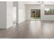 Spacious living room with hardwood floors and a bright, airy feel at 947 E Wiley Way, Casa Grande, AZ 85122