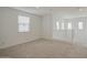 Bright and spacious upper level room with carpet and plenty of natural light at 9923 E Tahoe Ave, Mesa, AZ 85212