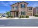 Charming two-story home with well-maintained landscaping and a welcoming front porch at 9923 E Tahoe Ave, Mesa, AZ 85212