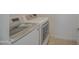 Bright laundry room with modern, front-loading LG washer and dryer at 9923 E Tahoe Ave, Mesa, AZ 85212