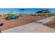 Vibrant community playground with slides, climbing frames, and shaded seating area for children to enjoy at 9923 E Tahoe Ave, Mesa, AZ 85212