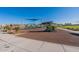 Inviting community playground with colorful climbing structures, slides, and shaded areas on a sunny day at 9923 E Tahoe Ave, Mesa, AZ 85212