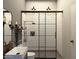 Stylish bathroom featuring glass-enclosed shower, modern fixtures, and contemporary vanity for a luxurious feel at 1038 E Northern Ave, Phoenix, AZ 85020