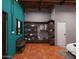 Bright bedroom boasts industrial style open closet with shelves and drawers, complemented by unique lighting at 1038 E Northern Ave, Phoenix, AZ 85020