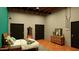 View of a modern bedroom with three black sliding closet doors at 1038 E Northern Ave, Phoenix, AZ 85020
