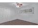 Bedroom features ceiling fan, hardwood flooring, and closet at 1038 E Northern Ave, Phoenix, AZ 85020