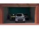 Garage featuring parking space for three cars; three cars are parked inside at 1038 E Northern Ave, Phoenix, AZ 85020