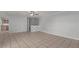Open-concept living space with tile flooring, ceiling fan, and easy access to kitchen area at 1038 E Northern Ave, Phoenix, AZ 85020