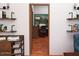 Bright office space featuring custom shelving, a large window and an ergonomic chair at 1038 E Northern Ave, Phoenix, AZ 85020