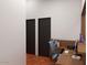 An efficient office space featuring a modern desk, ergonomic chair, and ample storage at 1038 E Northern Ave, Phoenix, AZ 85020