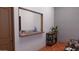 Serene waiting area with a convenient service window, a comfy bench, and a stylish bookshelf at 1038 E Northern Ave, Phoenix, AZ 85020