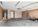 Spacious two car garage featuring built in storage cabinets along one wall at 11321 W Austin Thomas Dr, Surprise, AZ 85378