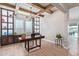 Chic office with hardwood floors, built-in shelving, and ample workspace at 11656 N San Clemente St, Surprise, AZ 85388