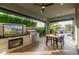 Outdoor patio featuring built-in grill and fireplace perfect for entertaining and enjoying open air living at 11656 N San Clemente St, Surprise, AZ 85388