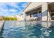 Enjoy a dip in this refreshing pool with water features, set against a beautifully landscaped backyard at 11656 N San Clemente St, Surprise, AZ 85388