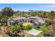 Beautiful home with a backyard pool, outdoor living space, and landscaped garden area at 12633 N 81St St, Scottsdale, AZ 85260