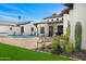Beautiful backyard with a private pool, patio, and well-manicured landscaping at 12633 N 81St St, Scottsdale, AZ 85260