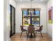 A charming breakfast nook with modern lighting and views of the landscaped backyard and outdoor fireplace at 12633 N 81St St, Scottsdale, AZ 85260