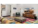 Cozy living room with a TV, mid-century modern decor, and a comfortable sofa at 12633 N 81St St, Scottsdale, AZ 85260