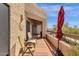 Enjoy outdoor living on this spacious balcony with comfortable seating and stucco walls at 14645 N Fountain Hills Blvd # 208, Fountain Hills, AZ 85268